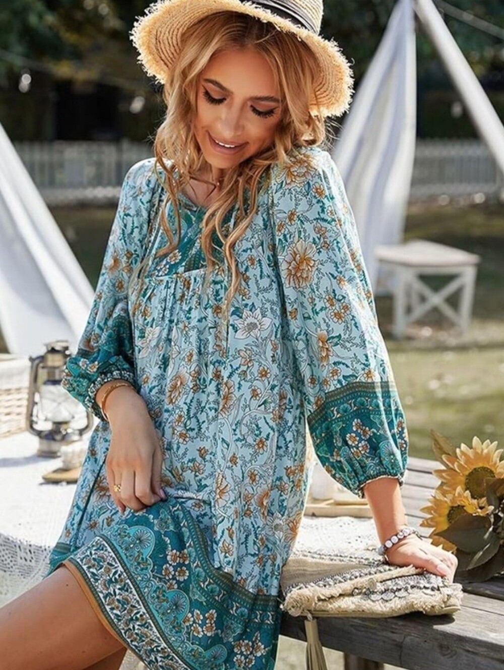 NWT..Qearal Bohemian Dress is a teal and floral boho swing mini dress Small